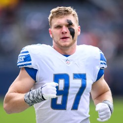 Aidan Hutchinson in football uniform #97