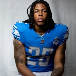 Jahmyr Gibbs in football uniform #26